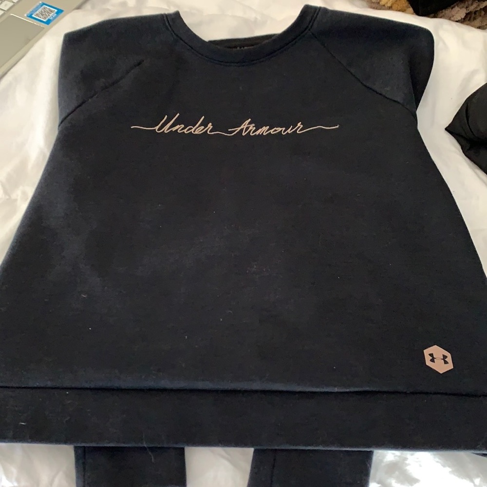 Black Under Armour crew neck with pink detailing
